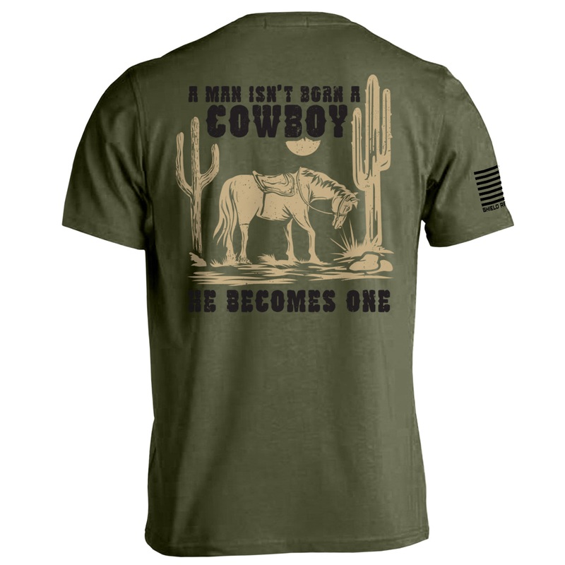 A Man Isn’t Born A Cowboy|Tee|Comfort Colors Pocket Tee|Comfort Colors Long Sleeve|Hoodie|Military Green|Black|Ox Blood|Tan|Ivory|Army